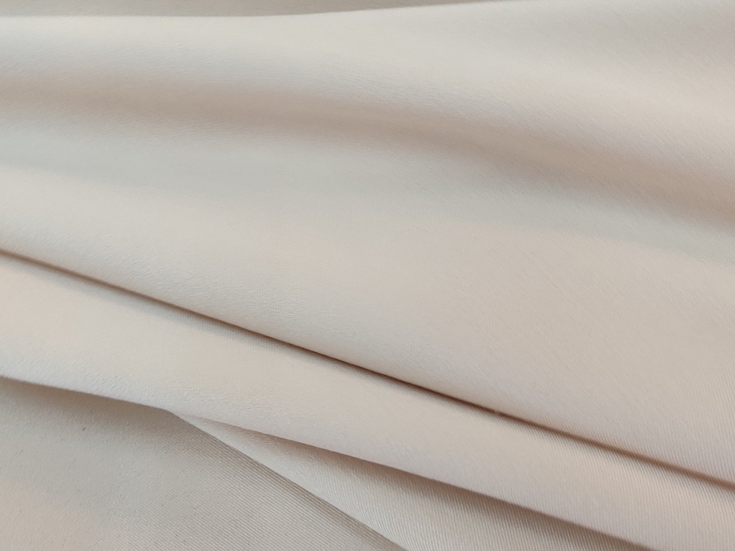 Light beige clothing fabric